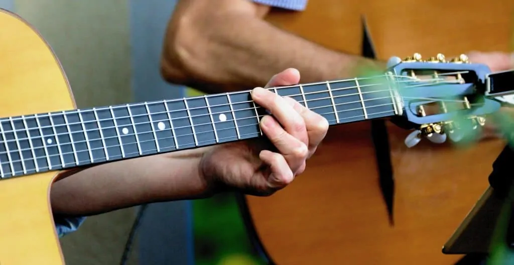 3 guitar fretboard fingers