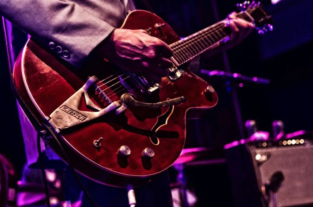 3 red gretsch guitar