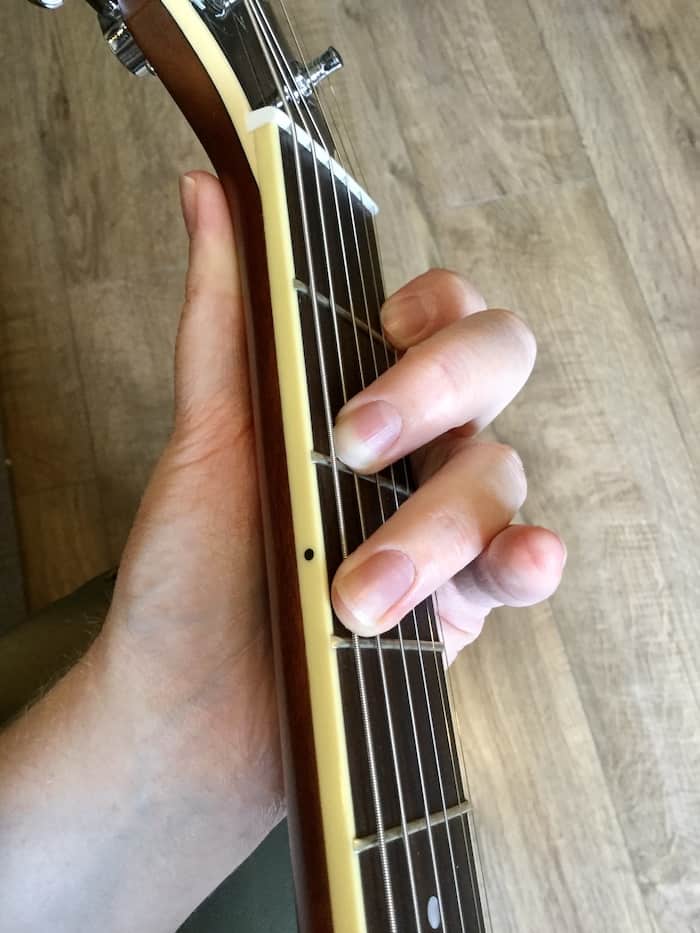 A PainFree Guide to Playing Guitar with Small Hands Beginner Guitar HQ