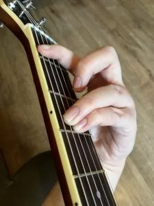 Power chord thumb back