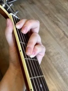 Power chord thumb over