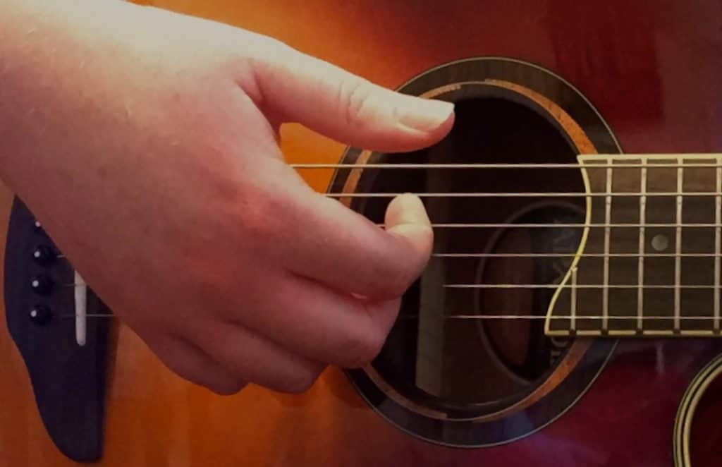 How To Strum Without A Pick | Beginner Guitar HQ