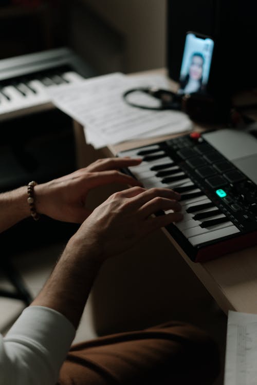 3. Guy hashing out some ideas on keyboard