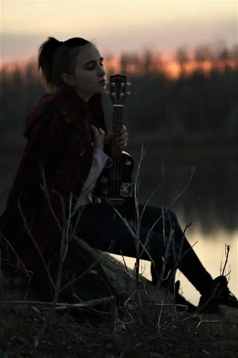 4.sad girl with guitar